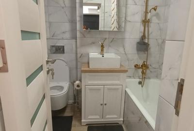 Garsonieră decomandată în Central - 7