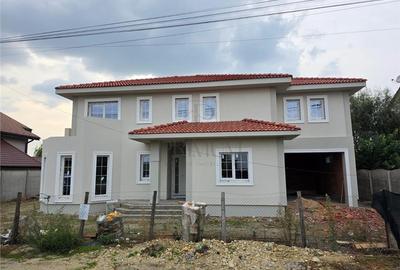 Casa individuala - teren 730 mp - garaj - 5 dormitoare - living 57 mp - 4