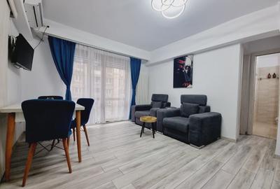 Apartament cu 2 camere semidecomandat, mobilat în P-ța Universității - 8