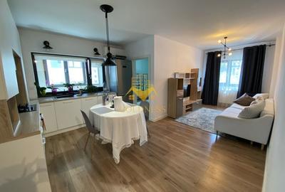 Apartament cu 3 camere semidecomandat, mobilat în Borhanci