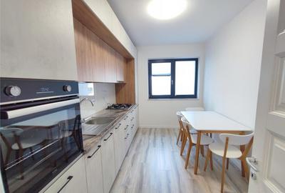 Bloc nou - langa Universitatea Bacovia - 2 camere - mobilat - 2