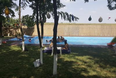 Teren intravilan 5000 mp, deschidere 70 m, Frumusani - DN4, iesire A0 si Centura - 11