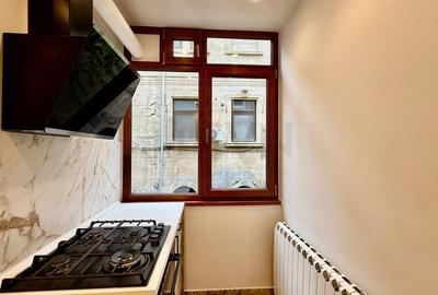 Apartament cu 3 camere semidecomandat, mobilat în Capitale - 17