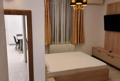 Inchiriez Apartament 2 camere 49 mp Navodari Centru langa Primarie,internet si tv inclus - 3