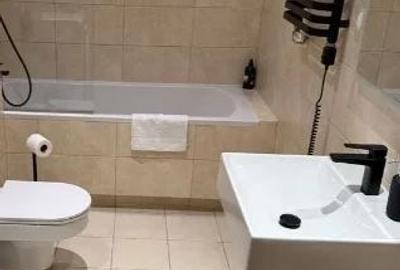 Garsonieră decomandată în Titan