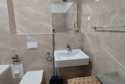 Apartament cu 3 camere decomandat în Tractorul - 1