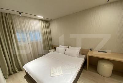 Apartament cu trei camere, 50 mp, ultrafinisat, zona Coada L - 19