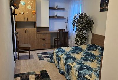 Apartament cu 3 camere de inchiriat zona Tractorul bloc nou - 23