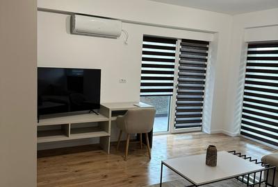 Apartament cu 2 camere semidecomandat, mobilat în Bucium - 4
