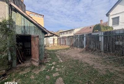 Casă cu 4 camere decomandat cu Teren 450 Mp în Budai - 1