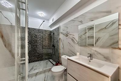 Apartament cu 2 camere semidecomandat, mobilat în Central