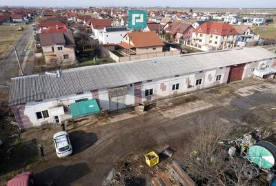 Teren intravilan 6.555 mp cu hală industrială - 6