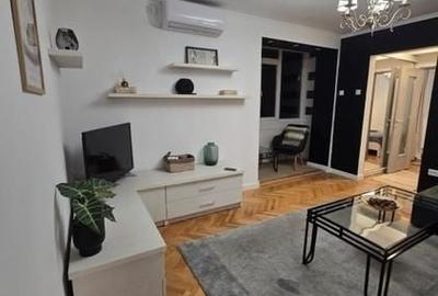 Apartament cu 2 camere semidecomandat, mobilat în P-ța Romană