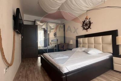 Apartament cu 2 camere semidecomandat, mobilat în Central