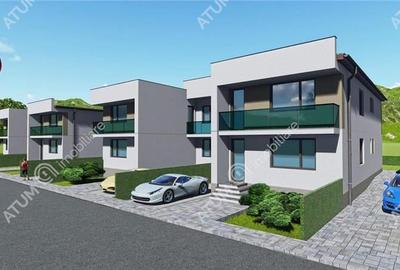 Casa cu 4 camere 2 bai curte de 50 mp zona Calea Cisnadiei Sibiu