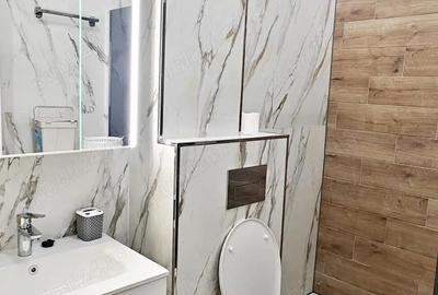 Garsonieră decomandată în Central - 8