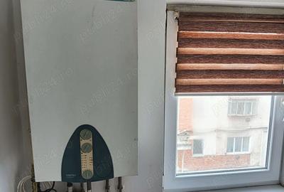 Garsonieră decomandată în Central - 7