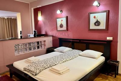 Garsoniera spatioasa - Piata Romana, vedere spre ASE, disponibila acum - 12