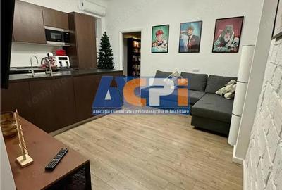 Apartament de #206;nchiriat #238;n Pia #539;a Roman #259; - Loca #539;ie Central #259; - 2