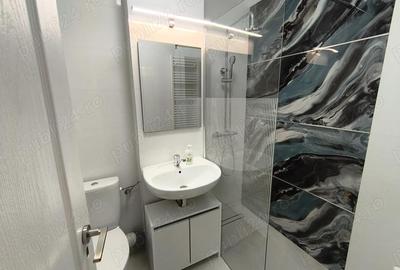 Garsonieră decomandată în Central - 9