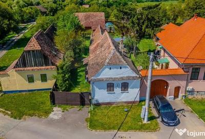 Casă cu 4 camere cu Teren 5576 Mp în Bunești - 1