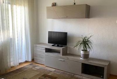 Apartament cu 2 camere semidecomandat, mobilat în Podu Roș