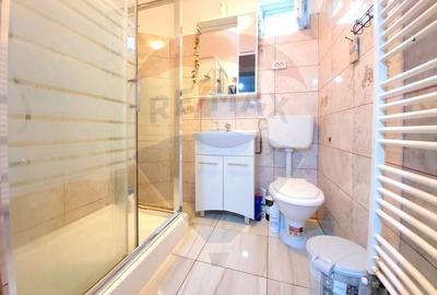 Casa de vanzare in zona Dambovita la curte comuna, 105.8mp utili - 4