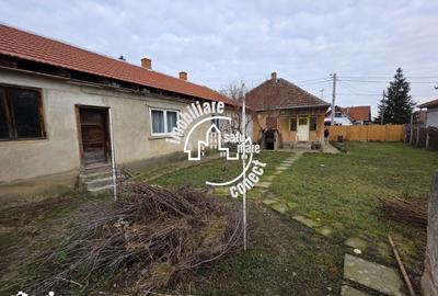 Casă cu 4 camere cu Teren 500 Mp în Titulescu