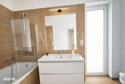 Apartament cu 4 camere decomandat în Europa