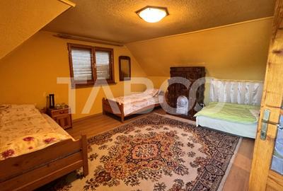 Casa de vanzare 6 camere loc de relaxare garaj teren 669 mp Cornatel - 11