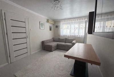 Apartament cu 3 camere semidecomandat, mobilat în Capitale - 1