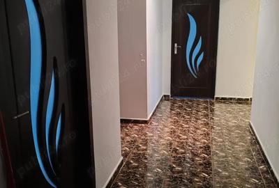 Apartament cu 4 camere decomandat în Roman - 2