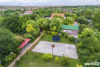 Casă cu 7 camere cu Teren 4000 Mp în Conacu - 1