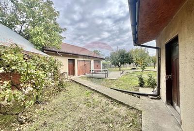 Casa de lemn cu teren generos de 1312 mp de vanzare in Fundulea - 34