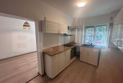 Apartament cu 2 camere, decomandat, centrala si AC, parter, cartier 1 Mai - 3