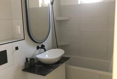 Apartament cu 3 camere semidecomandat în Central - 12