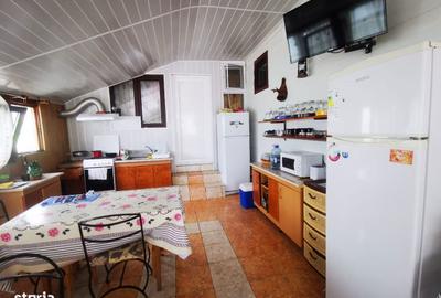 Casă cu 7 camere cu Teren 499 Mp în Tulnici - 11