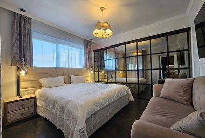 Inchiriere penthouse superfinisat cu 3 camere in zona Centrala - 1