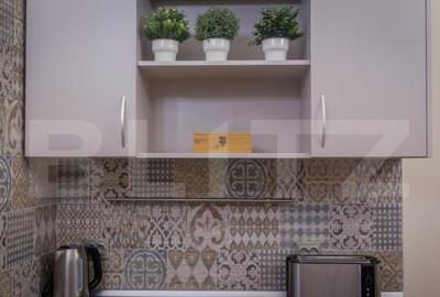 Apartament cu 4 camere semidecomandat, mobilat în Central