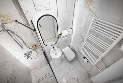 Garsonieră decomandată în Central - 6