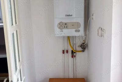 Dau in chirie o casa cu 1 camera, 1 bucatarie si 1 baie decomandate - 2