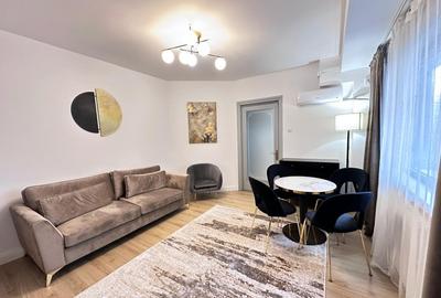 Apartament cu 2 camere decomandat, mobilat în P-ța Victoriei