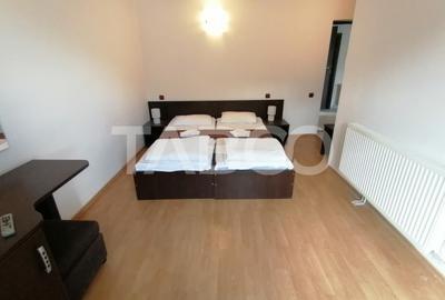 Pensiune 13 camere 16 bai sauna piscina si teren 1565 mp Cisnadioara - 21