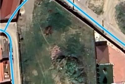 Teren intravilan, imprejmuit cu gard de beton, situat cartierul Mica Roma