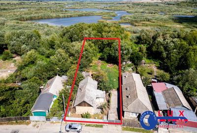 ID 7854 EXCLUSIVITATE – Teren cu casă și ieșire la canal - 2