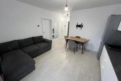 Apartament cu 2 camere semidecomandat în Chinteni