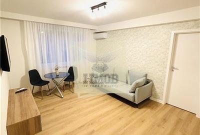 Apartament cu 2 camere semidecomandat, mobilat în Central