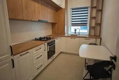 Apartament cu 3 camere decomandat în Tractorul - 8