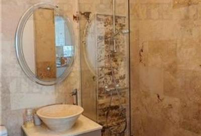 Apartament cu gradina proprie de 40 mp langa mare, incalzire in pardoseala, si f - 15