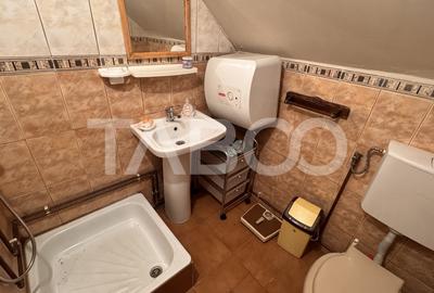 Casa de vanzare 6 camere loc de relaxare garaj teren 669mp Cornatel - 12